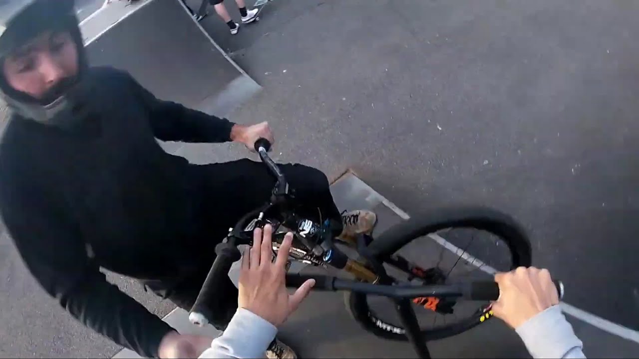 Scooter kid ran over by mountain bike