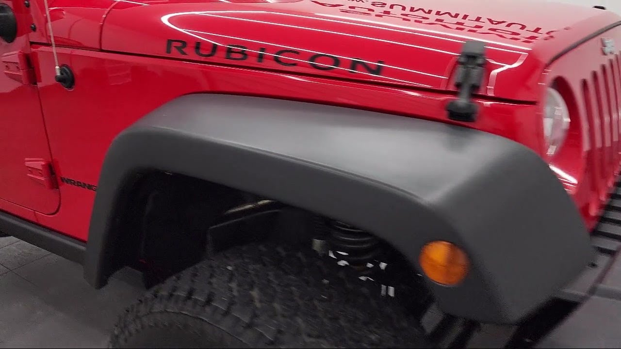 2015 Jeep Wrangler Rubicon Firecracker Red Clear Coat Used. walk around for sale in Fond Du Lac, Wis