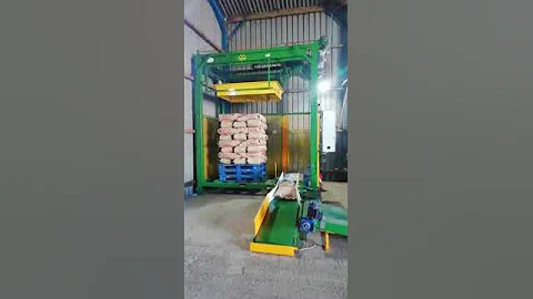 Roll-over bag conveyor and Palletiser