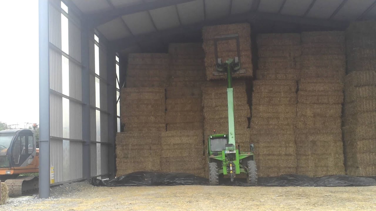 Merlo stacking  bales