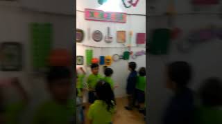 Children at their favourite job: Exploring the Music Wall!