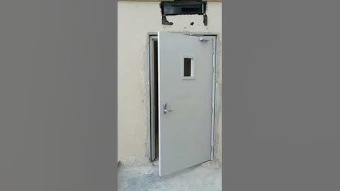Emergency Exit Fire Door with panic exit device with external trim with lock and vision panel