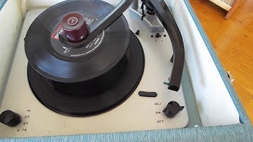 Symphonic automatic record player playing a stack of 45