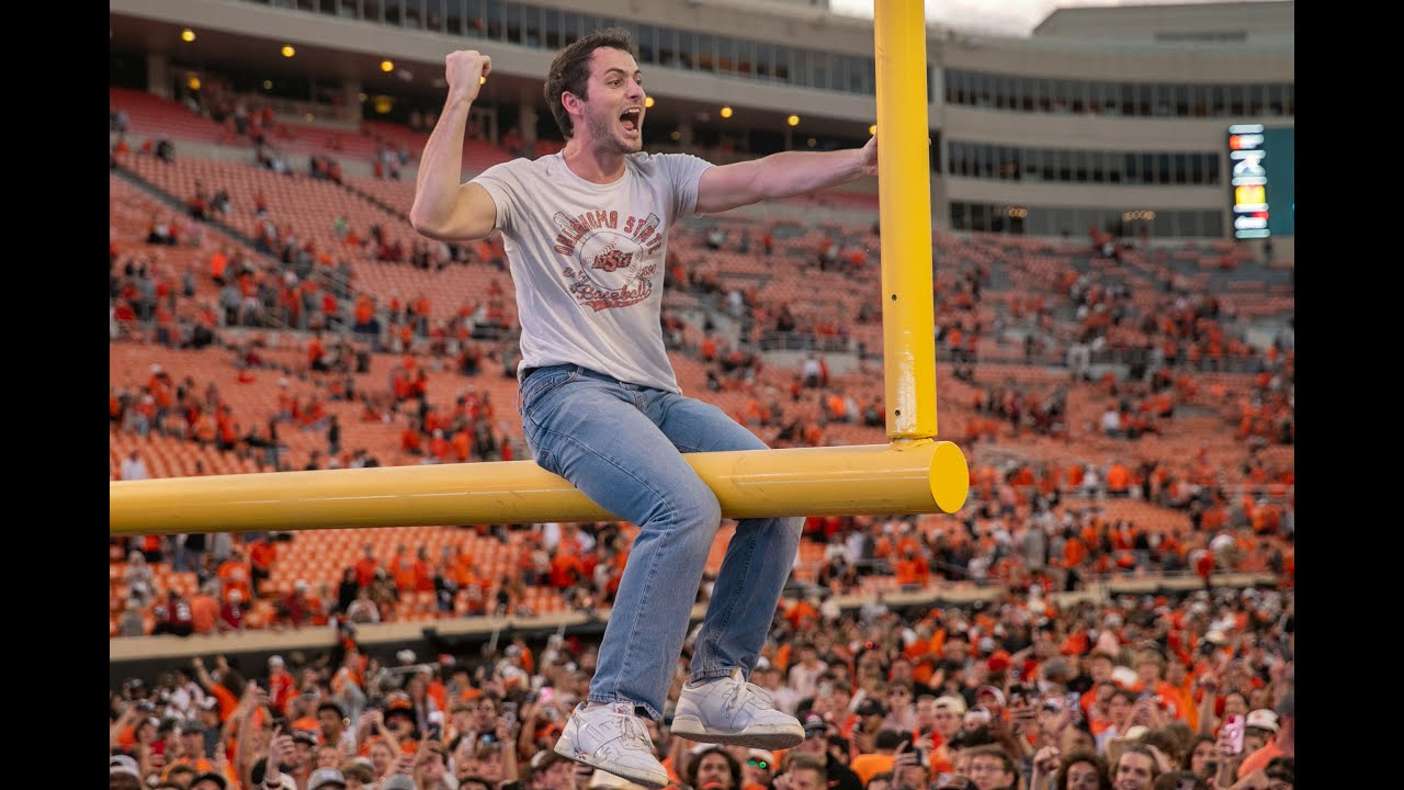 OSU fans tear down goal post and throw it in Theta Pond after Bedlam