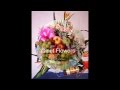Arreglos florales y frutas