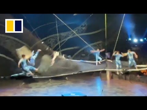 Performer falls from net after trampoline spring breaks