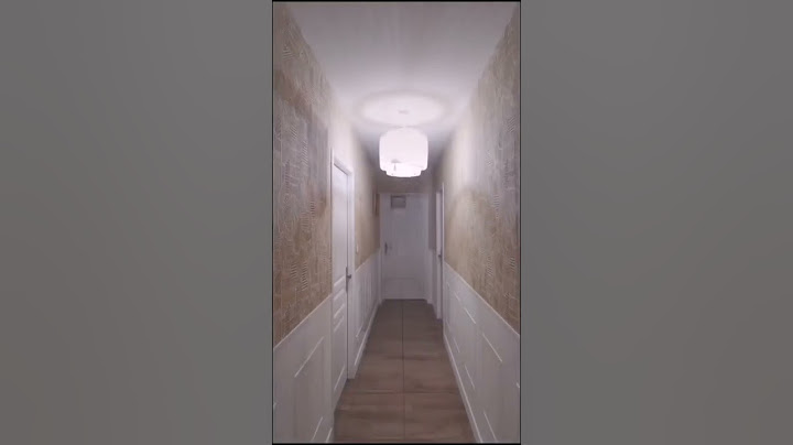 DÉCOR MOULURE ET PAPIER PEINT DANS COULOIR