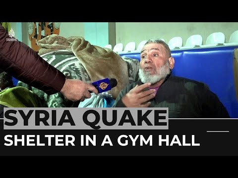 Dozens of Syrian families take shelter in a gym hall
