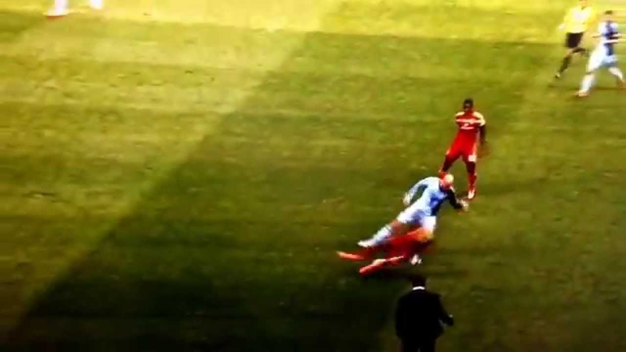 Abdoulie Mansally Tackles Aurelien Collin