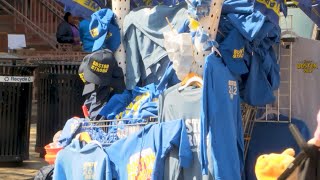 Spectators gather from all over the world for 129th Boston Marathon