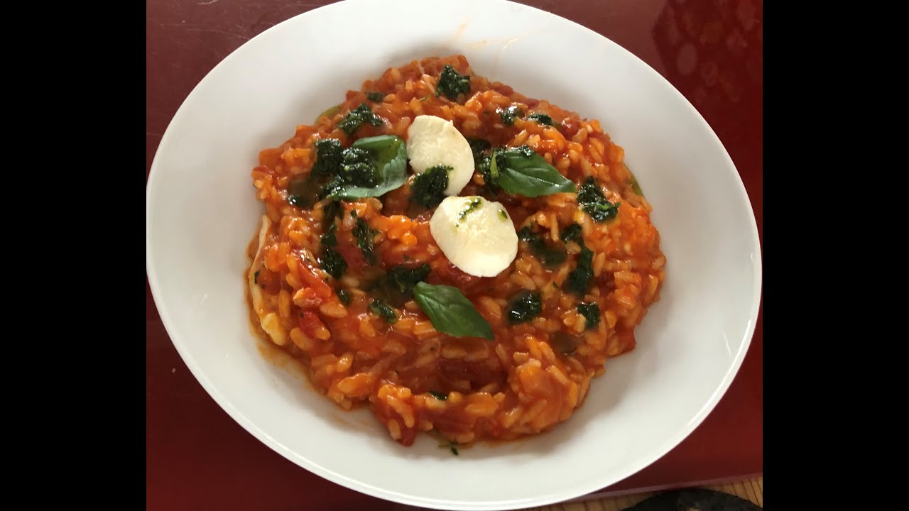 Easy tomato risotto served with mozzarella and basil oil YouTube