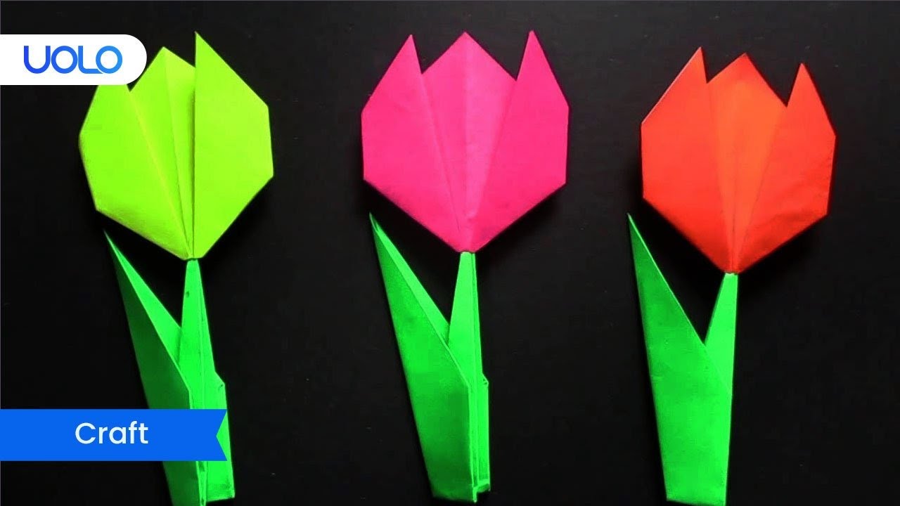 Тюльпаны из бумаги легкие для детей. Конструирование тюльпана из бумаги в старшей группе. Оригами цветок тюльпан. Оригами тюльпан из бумаги. Тюльпан оригами плоский.