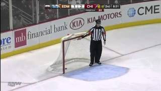 Patrick Kane scores own goal in empty net vs oilers 12 jan 2014