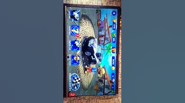 playing B B Racing in TV TCL hightec Short $ S S M 7#@