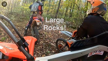 Tackling the rocky leave covered trails