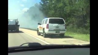 Grass fire on I-10 in Hancock County