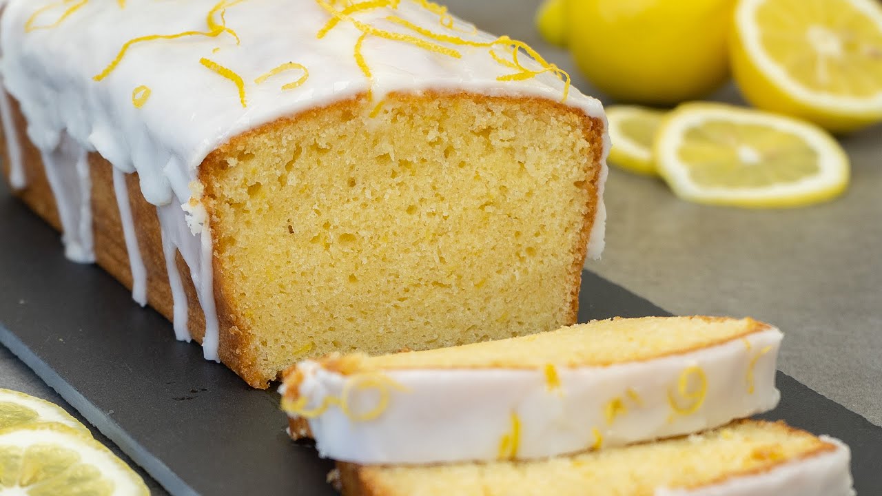 Лимонный торт в суффиксе полного. Lemon drizzle. Lemon Cake. Lemon Loaf. Iced Lemon Loaf Cake.