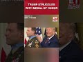 Watch | Trump Awkwardly Ties The Medal Of Honor Around An Army Hero's Neck! #shorts #trump