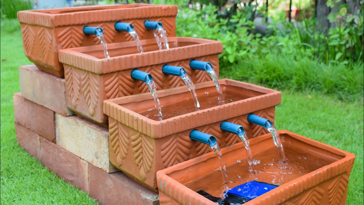 Make Awesome DIY Waterfall from flower planters Garden ideas ideas