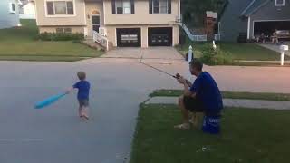 Dad Uses Fishing Rod to Teach Son How to Hit a Baseball - 990820