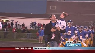 Wahoo football team adopts special needs boy