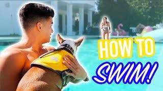 TEACHING OUR BABY HOW TO SWIM!