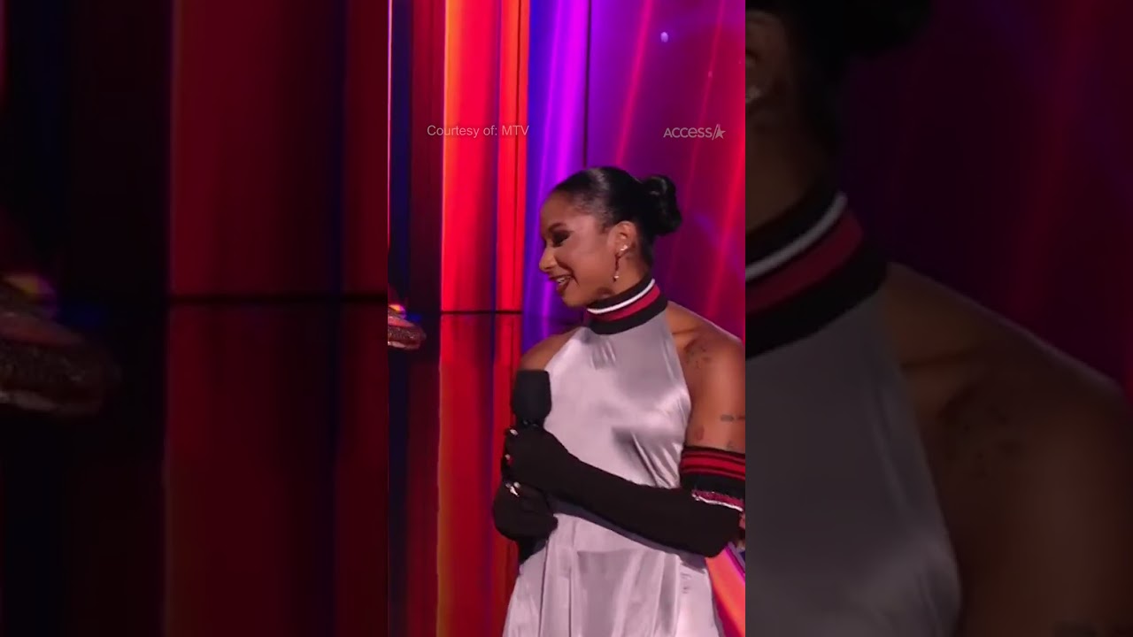 Flavor Flav Gives Jordan Chiles Clock Medal