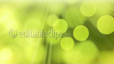 loopable abstract background slowly flying green yellow circle bokeh lights