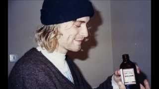 Kurt Cobain with bonnet and SMOKING (suicide)
