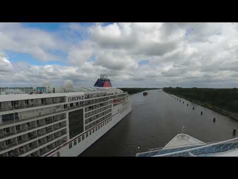 Kiel Canal passing of Azamara Pursuit and Europa 2 and their horny exchange. DJI Action 14 June 2022