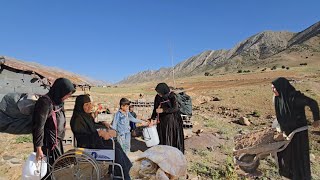 A widow with her two sons, bringing old belongings to a new cottage.