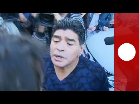 Video: Diego Maradona slaps reporter for 'winking' at ex-wife