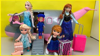 Airplane Elsa and Anna toddlers packing for Vacation Barbie is Pilot Doll Travel Routine