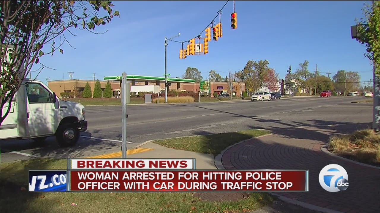 Woman arrested for hitting police officer during traffic stop - YouTube