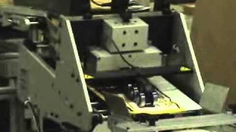 Vacuum Base System with XM-100 Bulk Loader Feeding Calendars