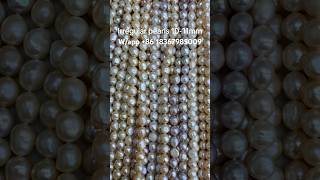 Nutless, orange-purple irregular pearls, 10-11mm in size, of good quality and with a good luster.