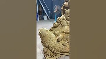 Di lạc cưỡi cá