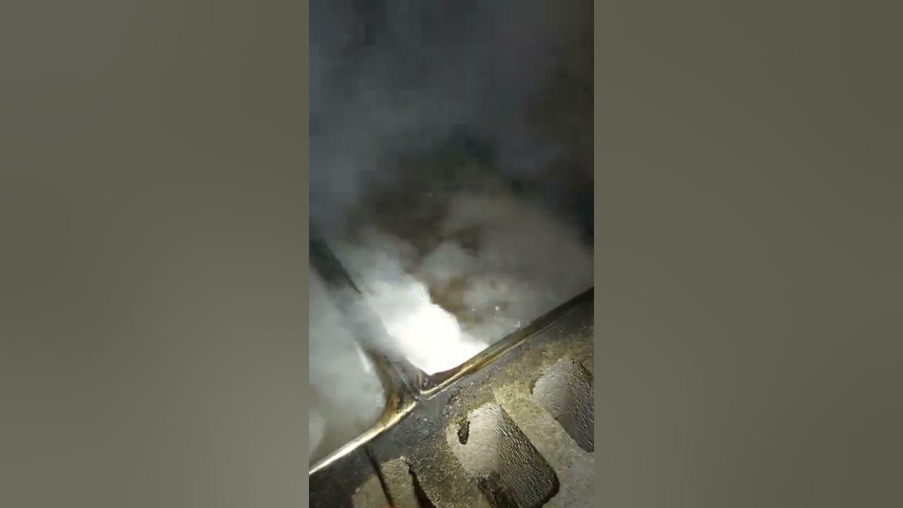 Boiling down maple sap in our cinder block evaporator. Delicious maple