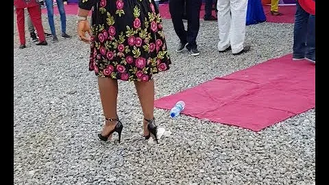 Lady Rocking High-Heel Shoes Almost Fell Down At Pasuma's All White 50th Birthday Party