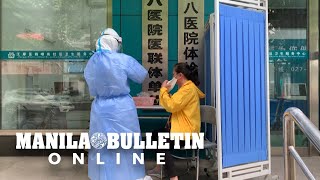 Wuhan to reportedly test entire population after new virus cluster