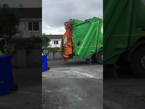 Barna recycling  Volvo fm collecting blue and black bins