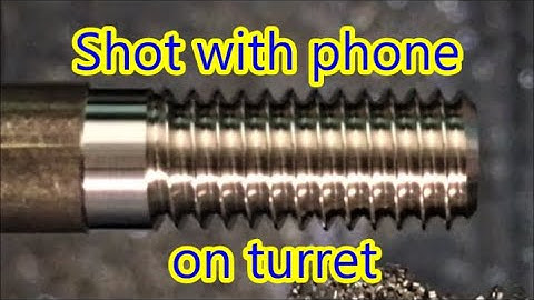Small cnc lathe cuts thread, camera mounted on tool turret