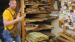 The lumber storage rack under the stairs