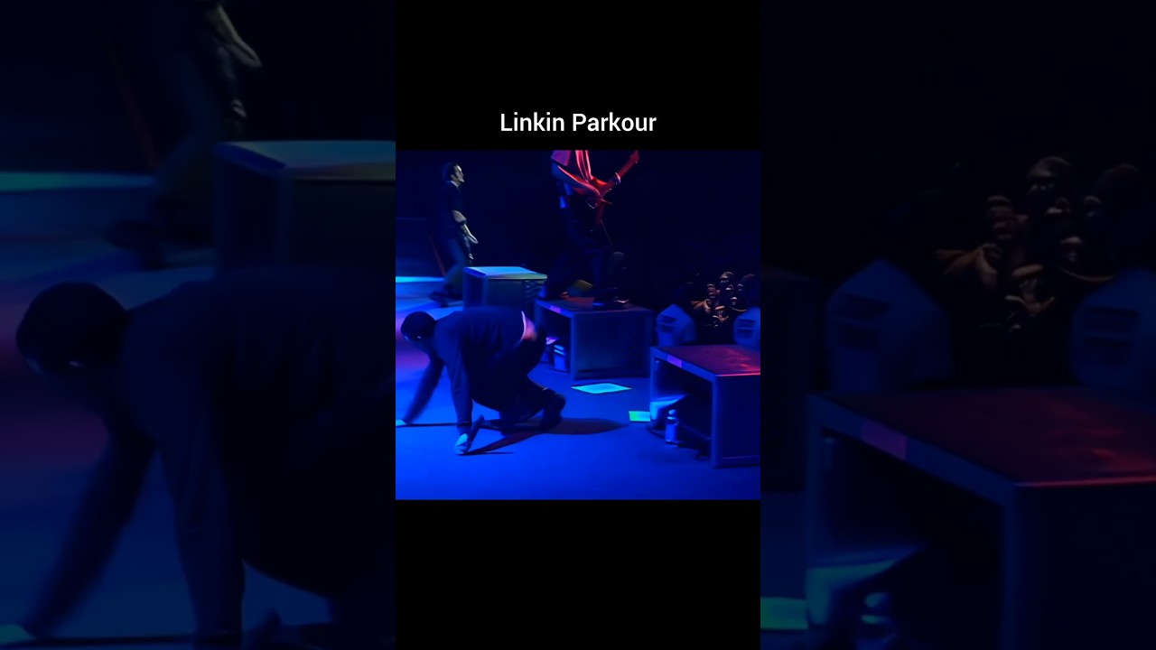 Chester Bennington falls during Linkin Park's "One Step Closer" live at PR 2002 