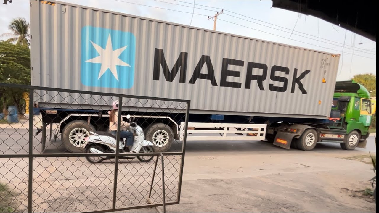 Road in Khmer | Traffic in the suburbs is busy with container trucks and large trucks