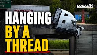 Semi dangles from Ohio interstate overpass after crash