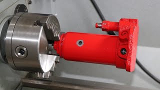 Turning a bottle jack into a hydraulic cylinder .