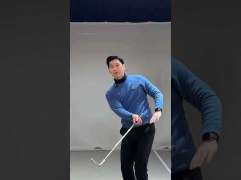 For approach shots, after impact, pull your left <strong>arm</strong> back..