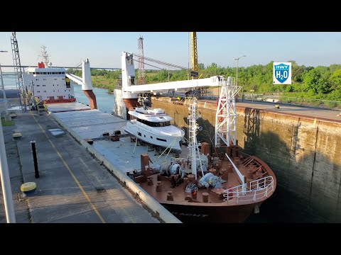 Ship pulling into lock 3 Cool yacht on deck