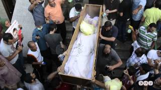 رصد |  خروج جثث شهداء رابعة من مسجد الإيمان في اليوم التالي للفض